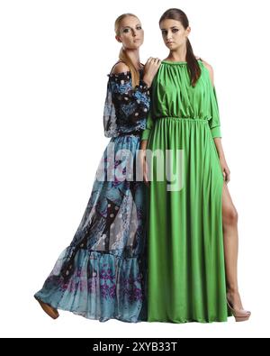 Portrait of two beautiful girls in long dresses Stock Photo