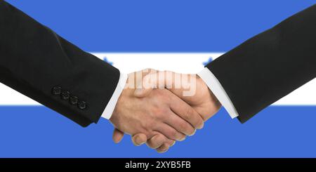 The Honduran flag and business handshake Stock Photo