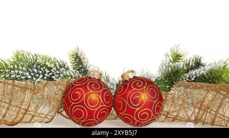 Christmas border from branch and balls on white background Stock Photo