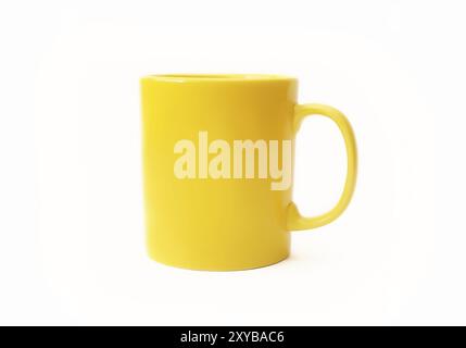 Yellow mug isolated on white background Stock Photo