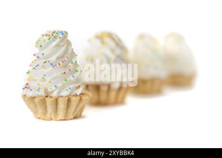 Some cream tarts isolated on a white background. Front focus Stock Photo