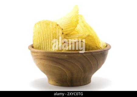 Potato chips in a small wooden bowl on white background Stock Photo