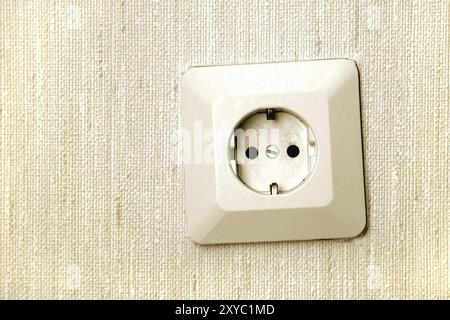 Close-up of electric socket on wall Stock Photo