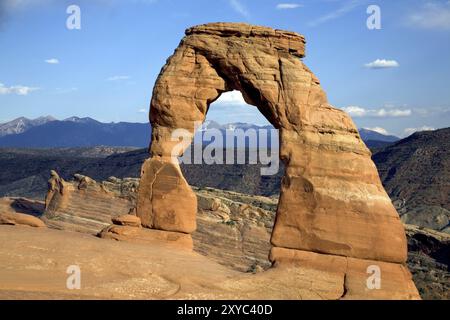 The Delicate Arch in Arches National Park in Utah in front of the La Sal Mountains Stock Photo