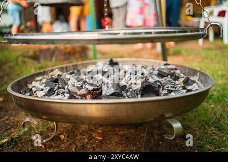 Grill Place with Hot Coal in a Metal Bowl Ready for Barbecue Stock Photo