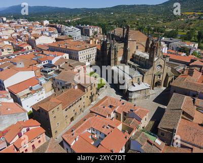 Historic city with an impressive cathedral, surrounded by narrow streets and old stone buildings with red roofs, aerial view, Romanesque and late Goth Stock Photo