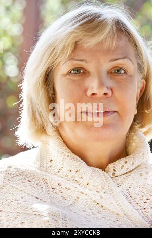 Close up portrait of a smiling middle age woman Stock Photo