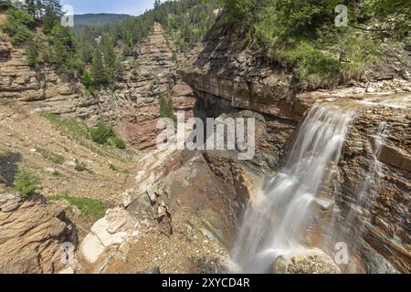 Waterfall in the Bletterbach gorge near Bolzano, South Tyrol Stock Photo