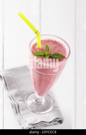 Strawberry milkshake or smoothie with oatmeal in a glass, top view copy space Stock Photo