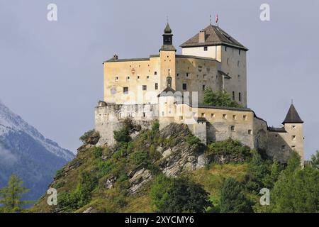 Tarasp castle in Switzerland, in autumn Tarasp castle in Switzerland, in the fall Stock Photo