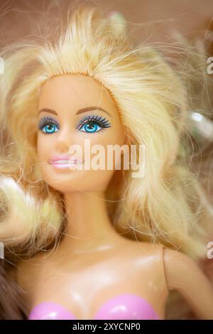 Close-up of a Barbie Doll Face with Blonde Hair Stock Photo