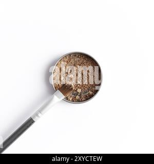 Light brown face shadow in container and eye shadow or make-up brush. Makeup concept flat lay on white background Stock Photo
