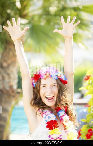 Happy woman enjoying sun on the beach. Summer vacations concept Stock Photo
