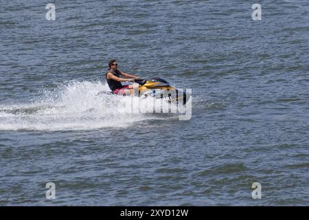 Amphibious water scooter, jetski riding on the Saint Lawrence River, Montreal, Province of Quebec, Canada, North America Stock Photo