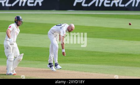 Taken in Birmingham, UK on 29 Aug 2024 at Warwickshire County Cricket Club, Edgbaston.  Pictured is #20, Olly Hannon-Dalby of Warwickshire in action bowling as he dismisses #14, Tasanda Mayeye of Kent caught by #61, Michael Burgess of Warwickshire  during the 2024 County Championship match between Warwickshire CCC & Kent CCC  Image is for editorial use only - credit to Stu Leggett via Alamy Live News Stock Photo