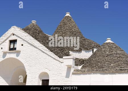 Trullo Sovrano in Alberobello, Apulia, Italy. The only trulli house with two floors in town. Alberobello was founded in the 15th century on land that Stock Photo