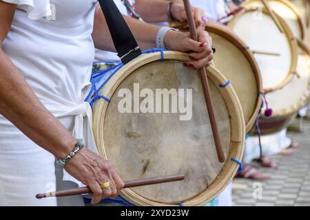 Womans percussionists playing drums during folk samba performance on Belo Horizonte, Minas Gerais Stock Photo