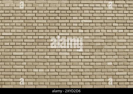 Almond Buff colored brick wall background Stock Photo