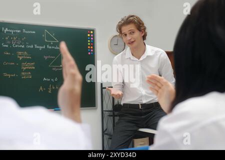 Teaching Mathematics in Classroom with Engaging Lessons Stock Photo