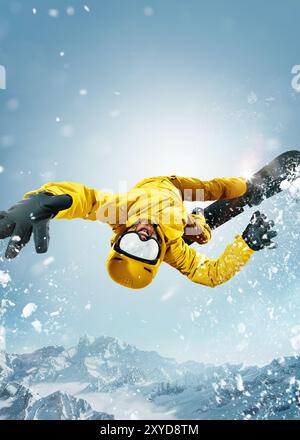 Snowboarder in bright yellow gear in upside down pose in motion, showcasing the daring and adventurous spirit of winter sports enthusiasts. Stock Photo