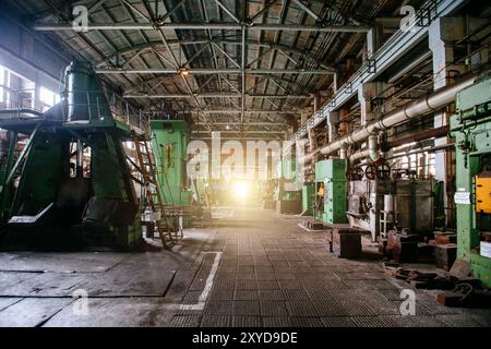 Heavy mechanical engineering factory production line. Interior of workshop. Stock Photo
