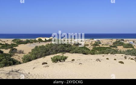 The beach of Piscinas on the west coast of the Italian Mediterranean island of Sardinia is one of the island's rather lonely coastal landscapes Stock Photo