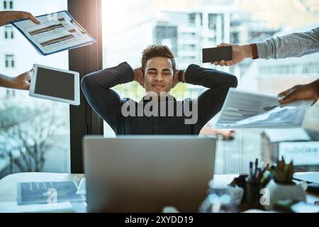 Calm, hands and man with smile, office and multitasking with busy schedule, laptop and stretching. Relax, group and demanding workload for employee Stock Photo