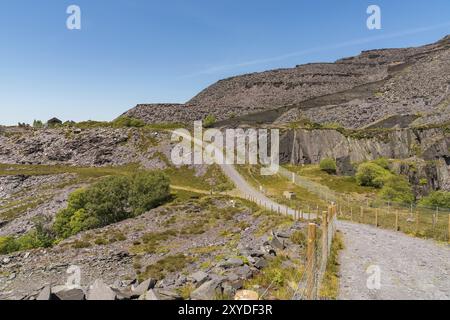 Walking in the derelict Dinorwic Quarry near Llanberis, Gwynedd, Wales, UK Stock Photo