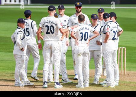 Taken in Birmingham, UK on 29 Aug 2024 at Warwickshire County Cricket Club, Edgbaston.  Pictured is #30, Ed Barnard of Warwickshire congratulated for his dismissal of #33, Joey Evison of Kent for 28, caught by #61, Michael Burgess of Warwickshire during the 2024 County Championship match between Warwickshire CCC & Kent CCC  Image is for editorial use only - credit to Stu Leggett via Alamy Live News Stock Photo