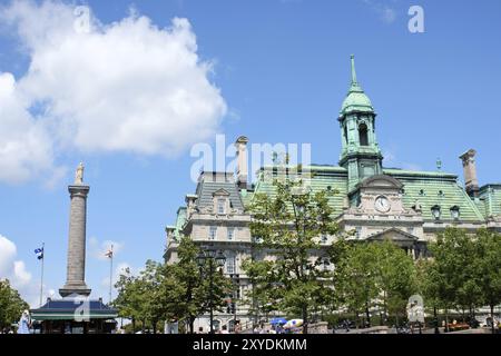 Montreal, Canada, July 26, 2008: Place Jacques Cartier (Jacques Cartier Square), Nelson Column and Montreal City Hall (Hotel de Ville de Montreal) wit Stock Photo