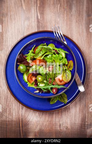 Mixed low calorie salad with olives and fresh avocado Stock Photo