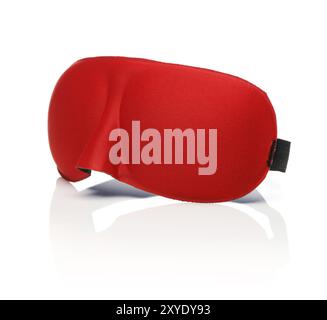 Red sleep mask isolated on white with reflection Stock Photo