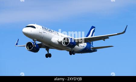 Aegean Airlines Airbus A320 Neo landing with a clear blue sky. London - 28th August 2024 Stock Photo