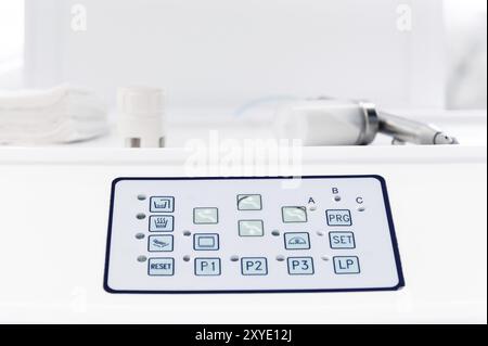 Close-up of the control panel with buttons on the dental chair Stock Photo