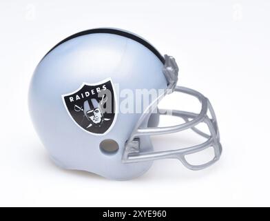 IRVINE, CALIFORNIA - AUGUST 30, 2018: Mini Collectable Football Helmet for the Oakland Raiders of the American Football Conference West. Stock Photo