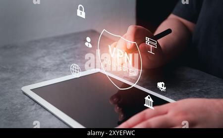 VPN Virtual Private Network protocol concept, Woman use digital tablet with vpn icon on hologram interface. VPN concept. Stock Photo