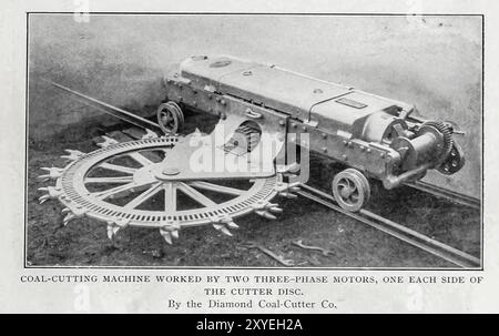 COAL-CUTTING MACHINE WORKED BY TWO THREE-PHASE MOTORS, ONE EACH SIDE OF THE CUTTER DISC. By the Diamond Coal-Cutter Co. from the Article APPLICATIONS OF ELECTRICITY IN THE COLLIERIES OF GREAT BRITAIN. By Sydney F. Walker. from The Engineering Magazine Devoted to Industrial Progress Volume XIX 1900 The Engineering Magazine Co Stock Photo