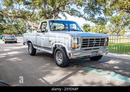 Gulfport, MS - October 07, 2023: High perspective front corner view of a 1986 Ford F150 XLT Pickup Truck at a local car show. Stock Photo