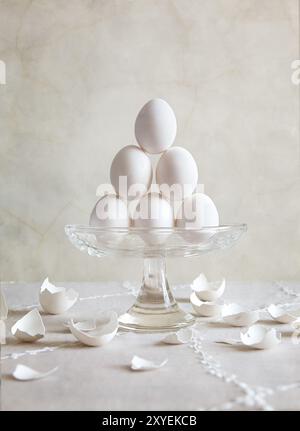 Still life with eggs in a glass bowl Stock Photo