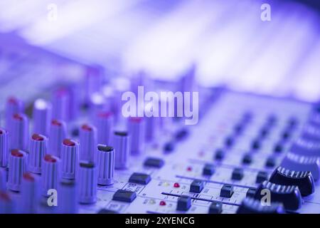 Professional music production in a sound recording studio, mixer desk Stock Photo