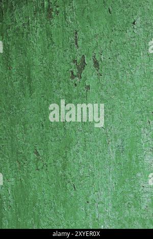 Texture of a wooden board in green, Cracked from time green paint on a wooden surface Stock Photo