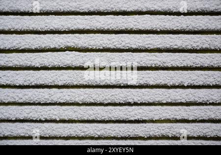 Snow on the roof of a mountain hut Stock Photo