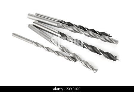 Many different drill bits isolated on white Stock Photo