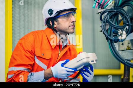 Mechanical engineering team working in robotic technology lap for research and develop for manufacturing automation and robotics. Stock Photo