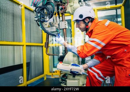 Mechanical engineering team working in robotic technology lap for research and develop for manufacturing automation and robotics. Stock Photo