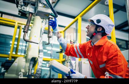 Mechanical engineering team working in robotic technology lap for research and develop for manufacturing automation and robotics. Stock Photo