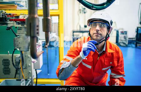 Mechanical engineering team working in robotic technology lap for research and develop for manufacturing automation and robotics. Stock Photo