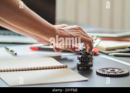 The factory mechanical engineering team is designing and developing gear sets to keep the machines running perfectly because gear sets are essential i Stock Photo