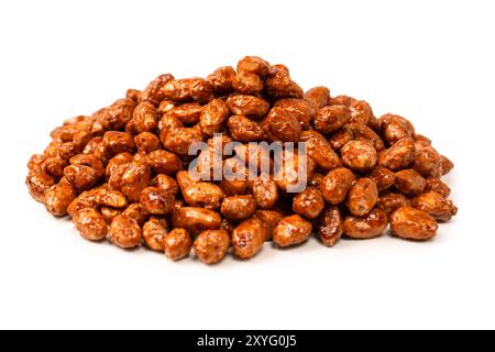 Tasty sweet roasted peanuts isolated on a white background. Stock Photo