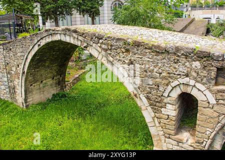 Tanner’s Bridge in central Tirana, Albania. An arched stone 18th century Ottoman footbridge that crossed the Lana River at the time Stock Photo